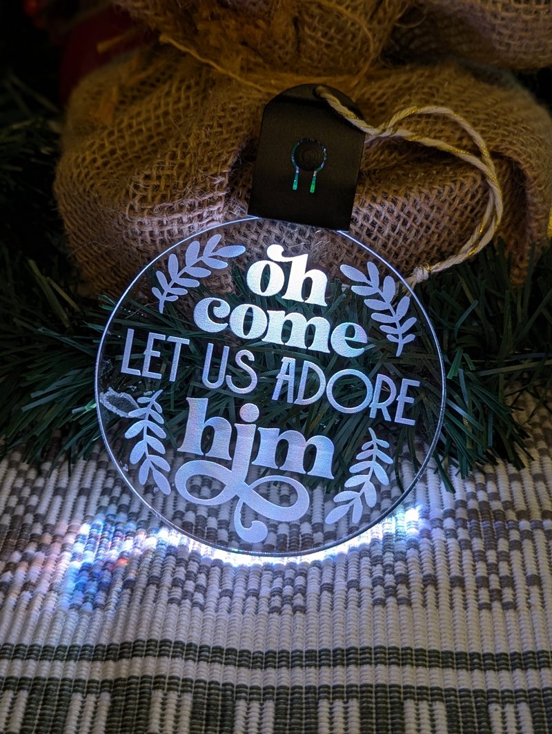 Custom engraved Christ, the Lord bauble illuminated with multi-colour LED lights