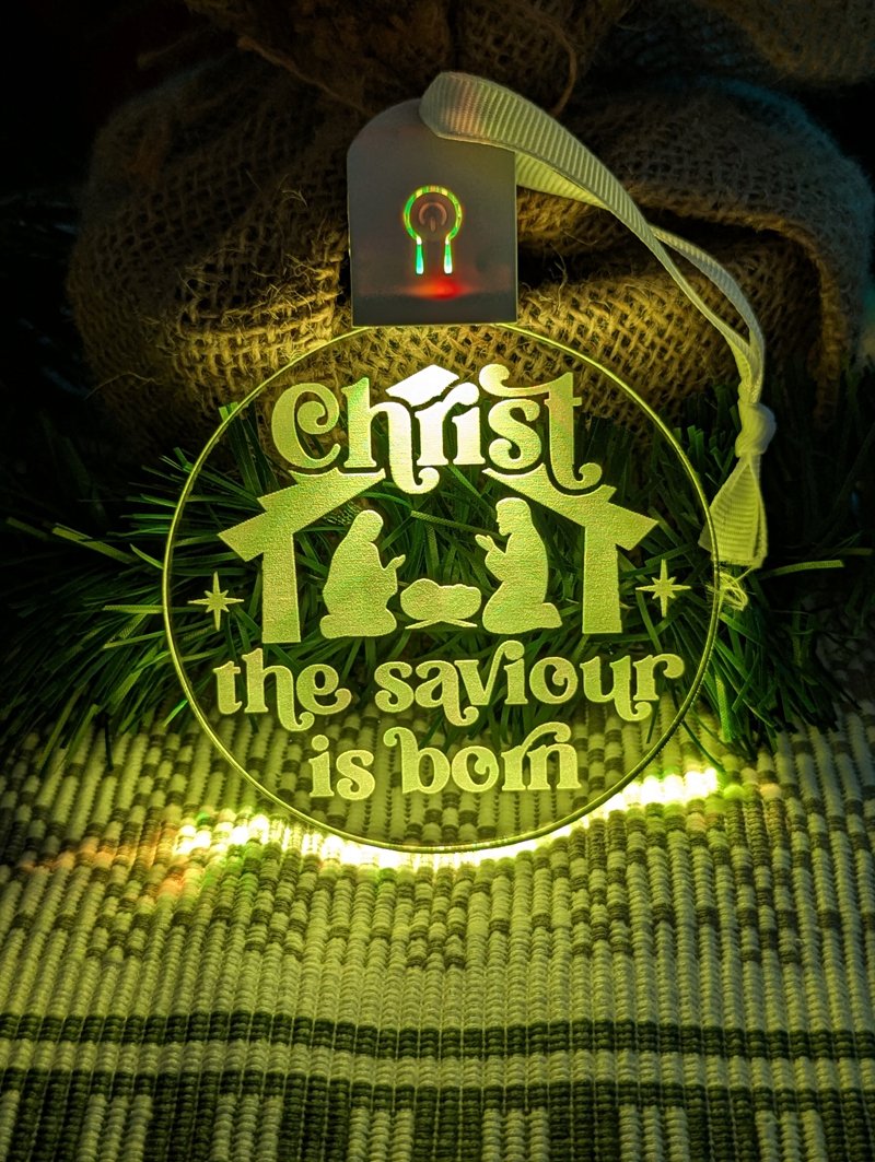 Custom engraved Christ the Saviour is Born bauble illuminated with multi-colour LED lights