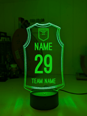 Personalised AFL inspired Jersey 3D LED night light glowing softly in a child’s bedroom with remote control