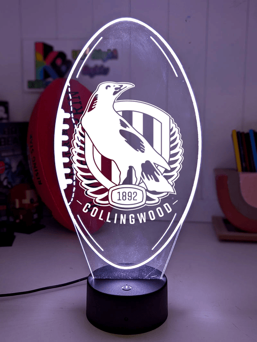 Collingwood Magpies ball shaped LED lamp with 16-colour light modes and remote.