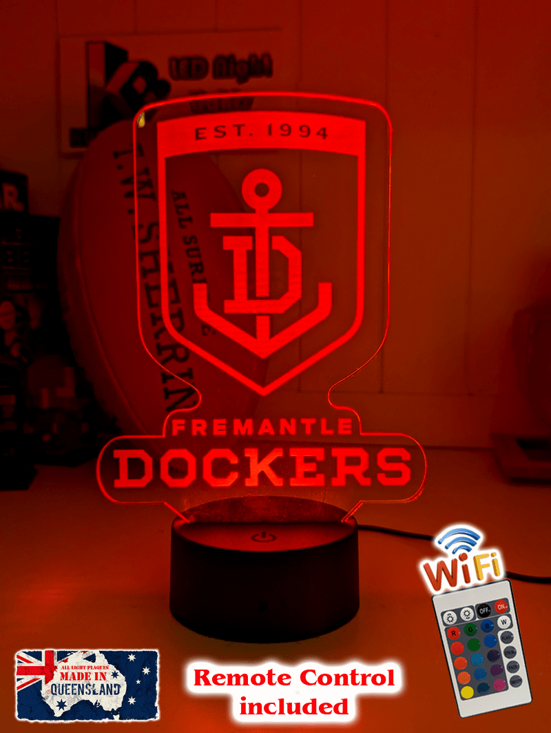 Freemantle Dockers 3D LED night light glowing softly in a child’s bedroom with remote control.