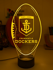 Fremantle dockers 3D LED ball light – AFL team décor for man caves, bars or fan spaces.