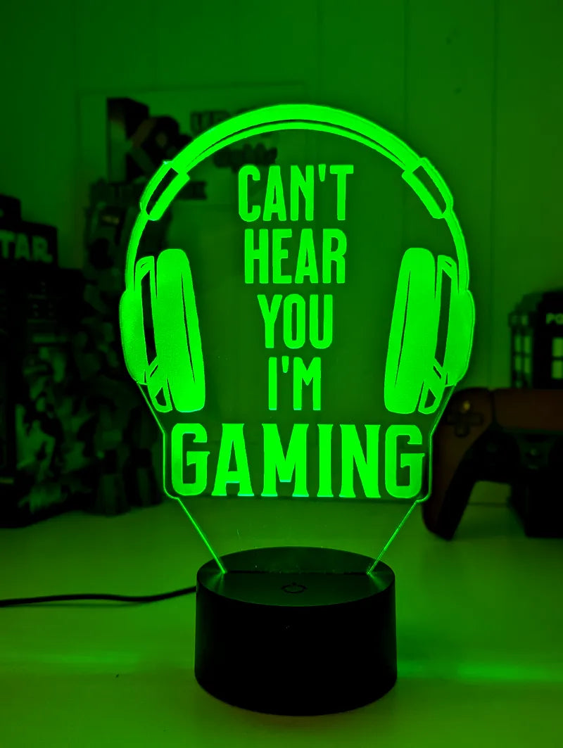 LED lamp with green text 'Can't Hear You I'm Gaming' inside headphones  
