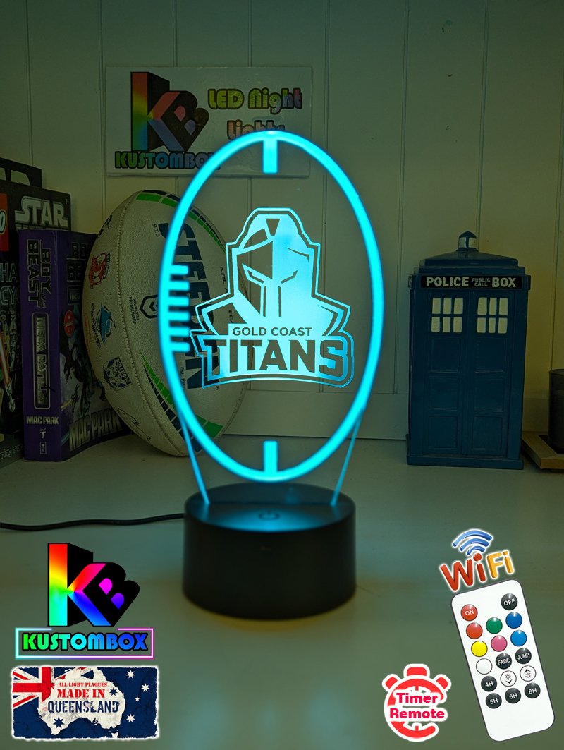 Custom Gold Coast Titans LED lamp with engraved name, multi-colour lighting for rugby league fans, ball shape, current logo. 