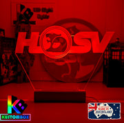 HSV Holden Racing V8 Super Cars Logo 3D LED night light engraved on clear acrylic with vibrant multi-colour glow, ideal for man caves and garages.