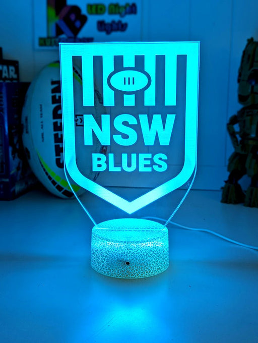 Personalised NSW Blues acrylic LED night lamp, flashing or fading NRL team logo display, white crackle base blue 