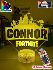 Personalised LED night light with Fortnite design and custom name acrylic lamp glowing on white background