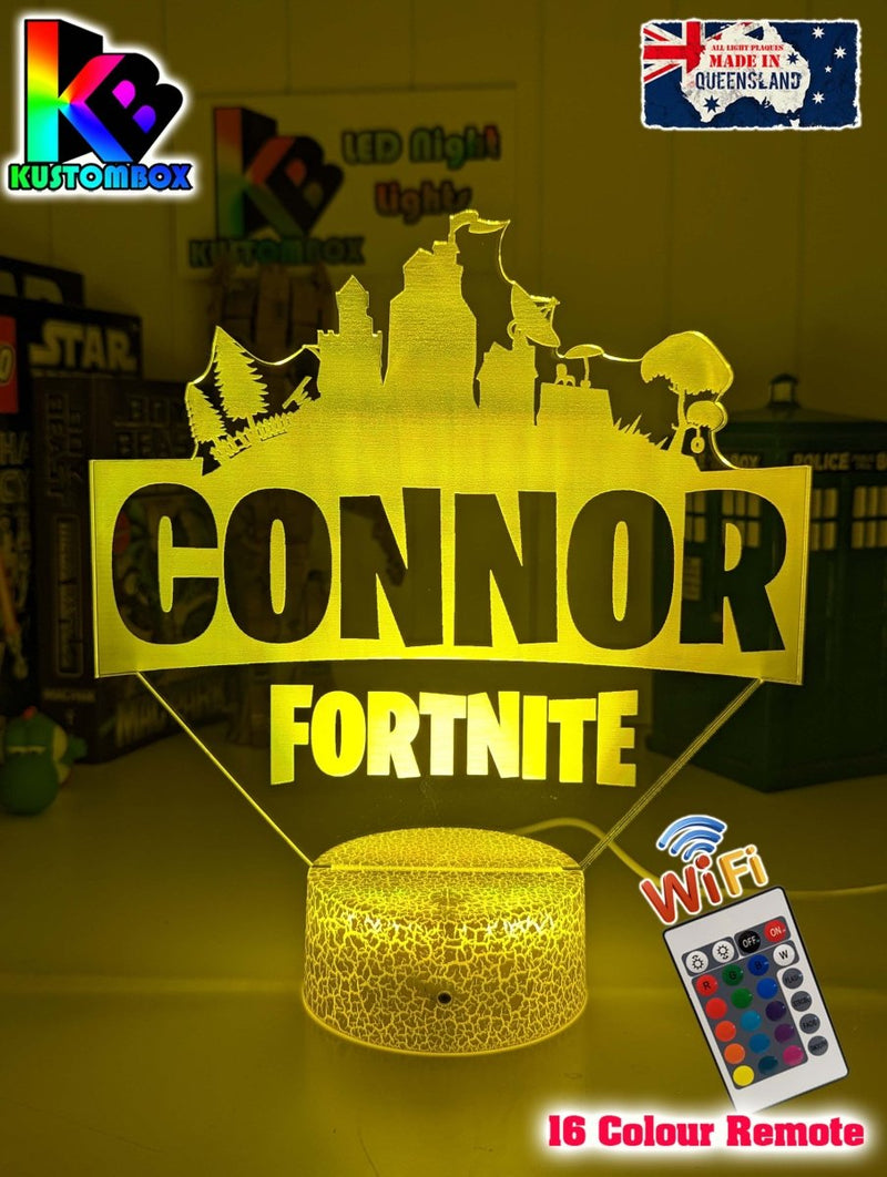 Personalised LED night light with Fortnite design and custom name acrylic lamp glowing on white background