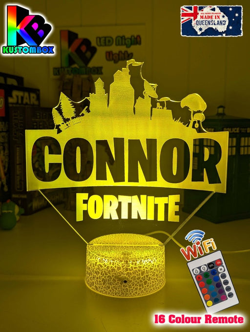 Personalised LED night light with Fortnite design and custom name acrylic lamp glowing on white background