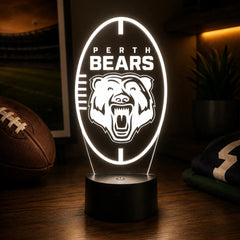 Perth Bears logo on a night light with sports equipment in the background