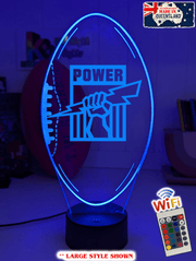 Port Adelaide Power 3D LED night light glowing softly in a child’s room.