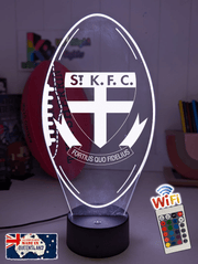 St Kilda Saints Australian Football Club St Kilda Saints old logo 3D LED night light glowing softly in a child’s bedroom with remote control.