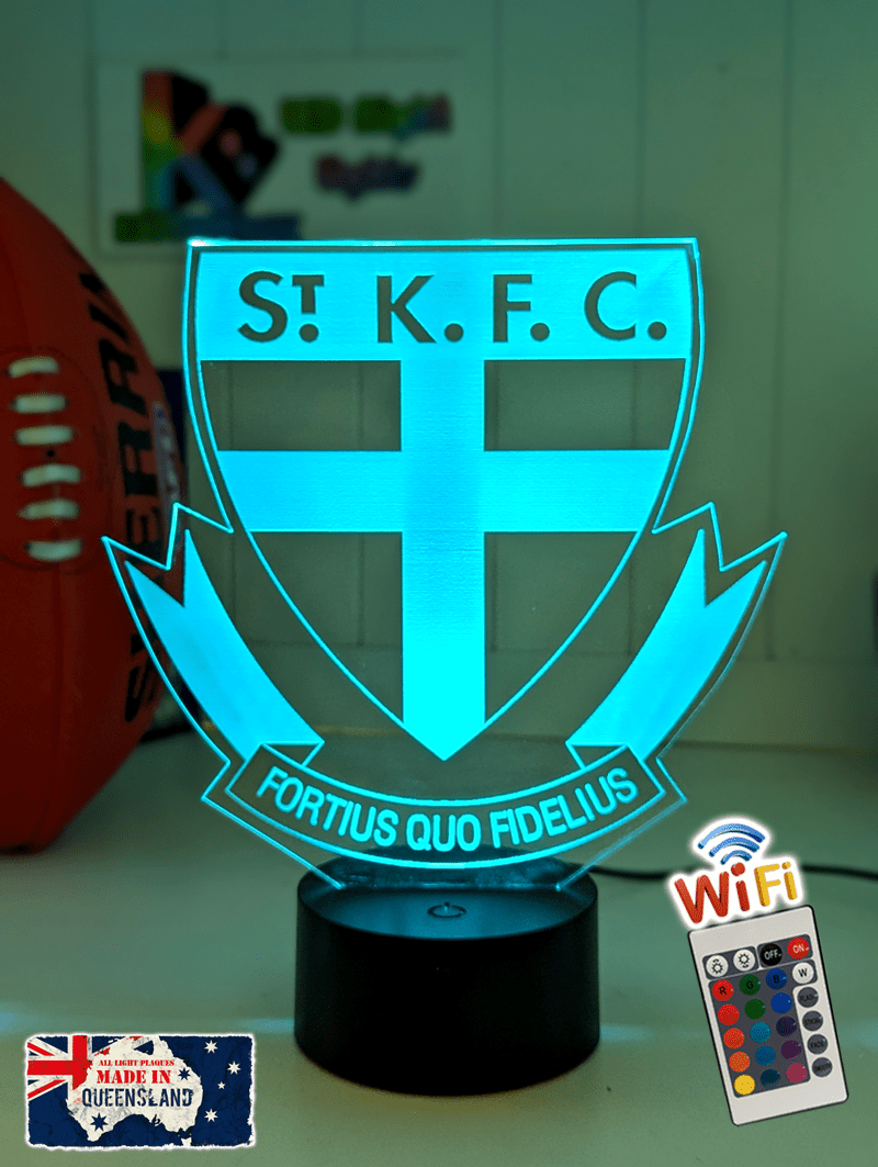 St Kilda Saints old logo 3D LED night light glowing softly in a child’s bedroom with remote control.