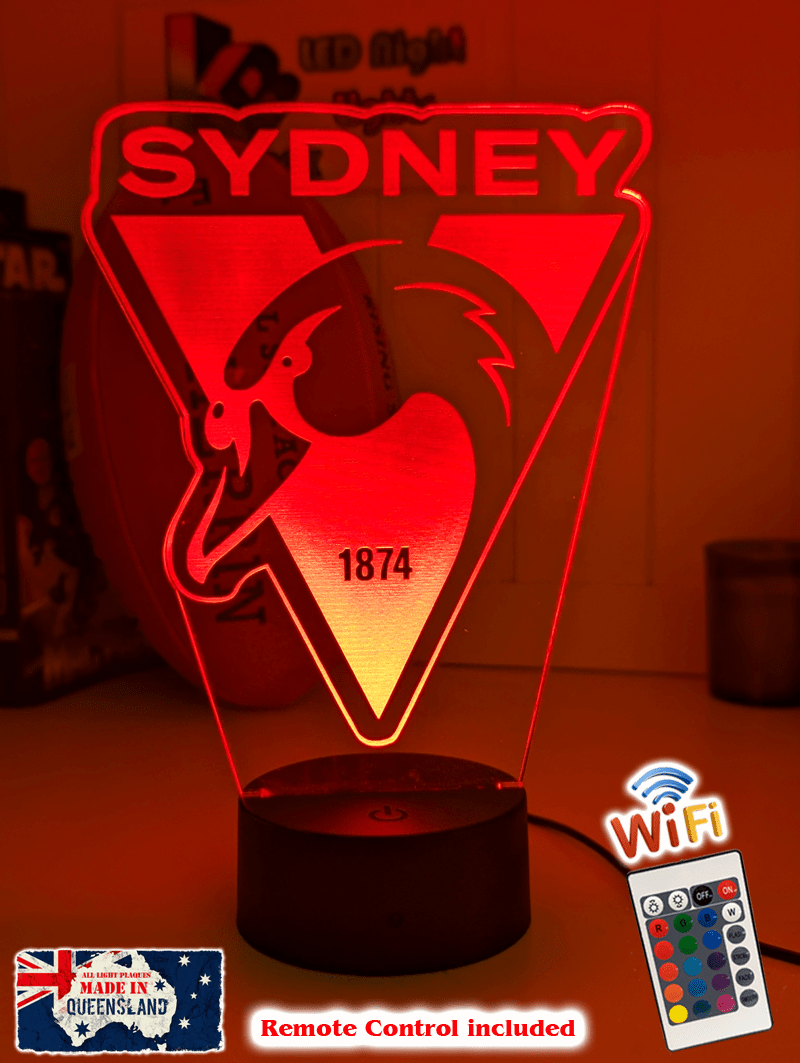 Sydney swans 3D LED night light glowing softly in a child’s bedroom with remote control.